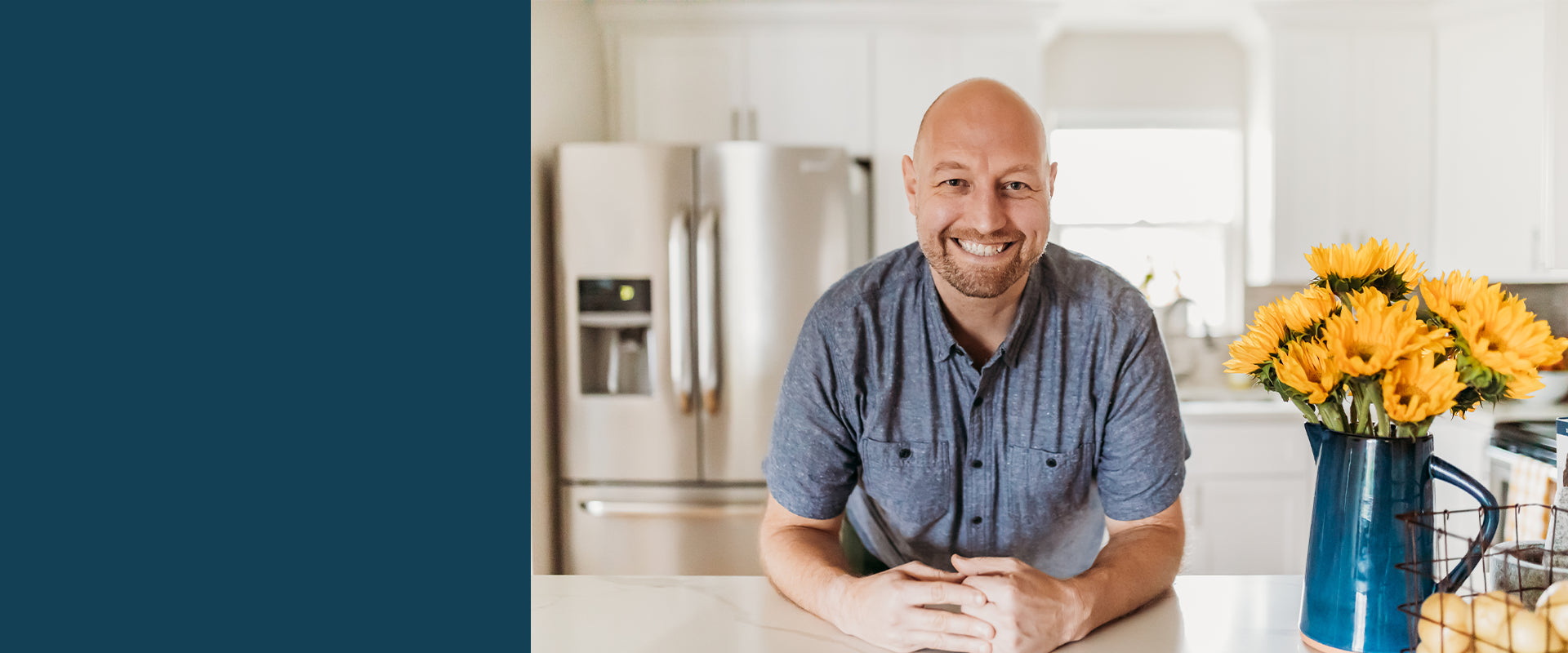 Headshot image in a kitchen of SSeaBear Ambassador, Reed Dunn of Pesto & Potatoes | SeaBear Smokehouse