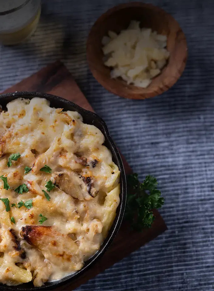 Dungeness rab Mac & Cheese on a table | SeaBear Smokehouse