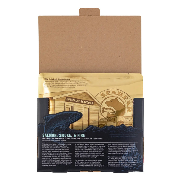 Open 6ox smoked salmon fillet box with a signature gold seal pouch sticking out | SeaBear Smokehouse