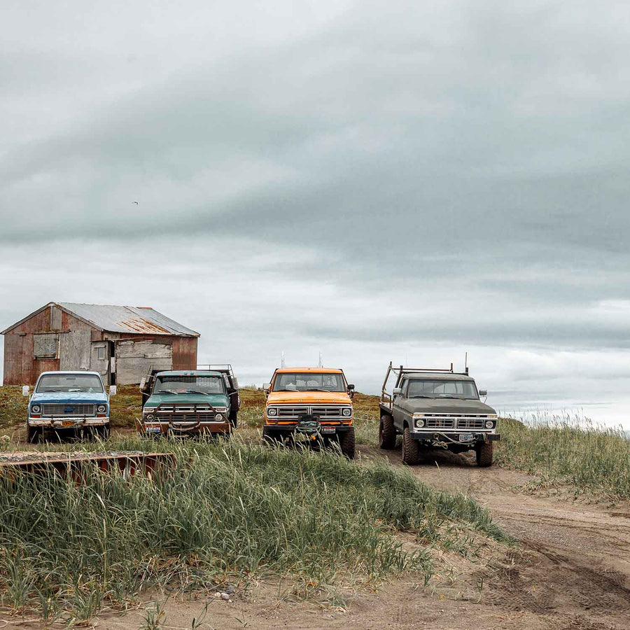 Vehicles line on the shore of Coffee Point, Alaska | Fresh & Wild | SeaBear Smokehouse