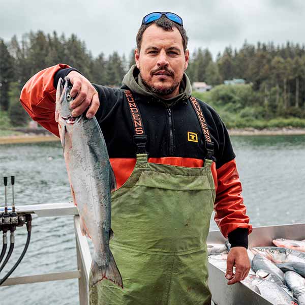 Man Holding Coho Salmon in Yakutat, Alaska | Fresh & Wild | SeaBear Smokehouse