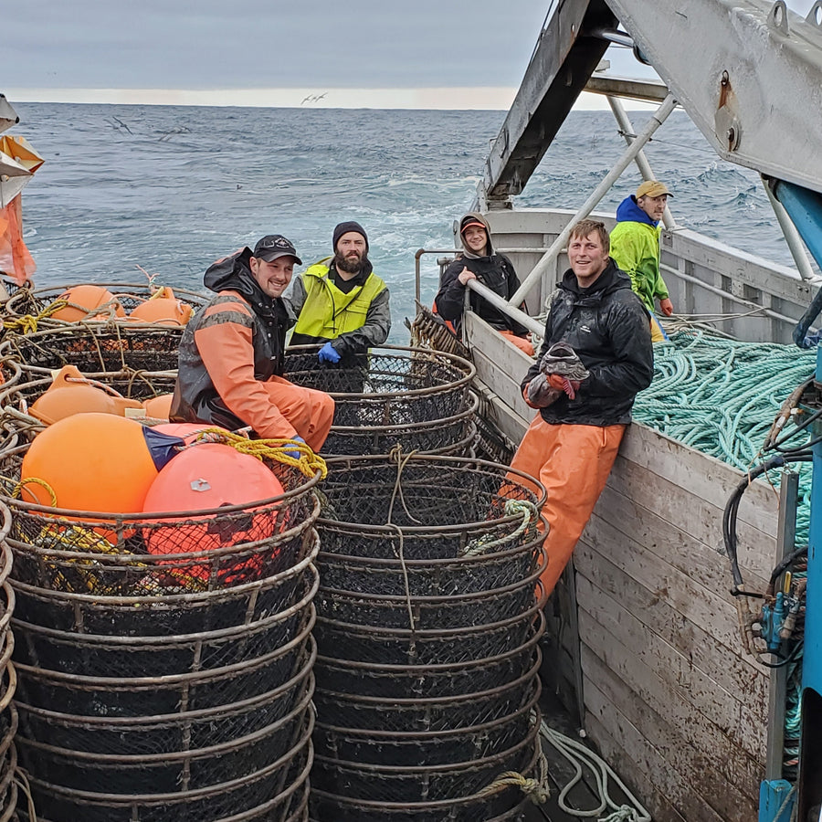 Fishermen Gathered Around a Fishing Vessel with Nets | Fresh & Wild | SeaBear Smokehouse