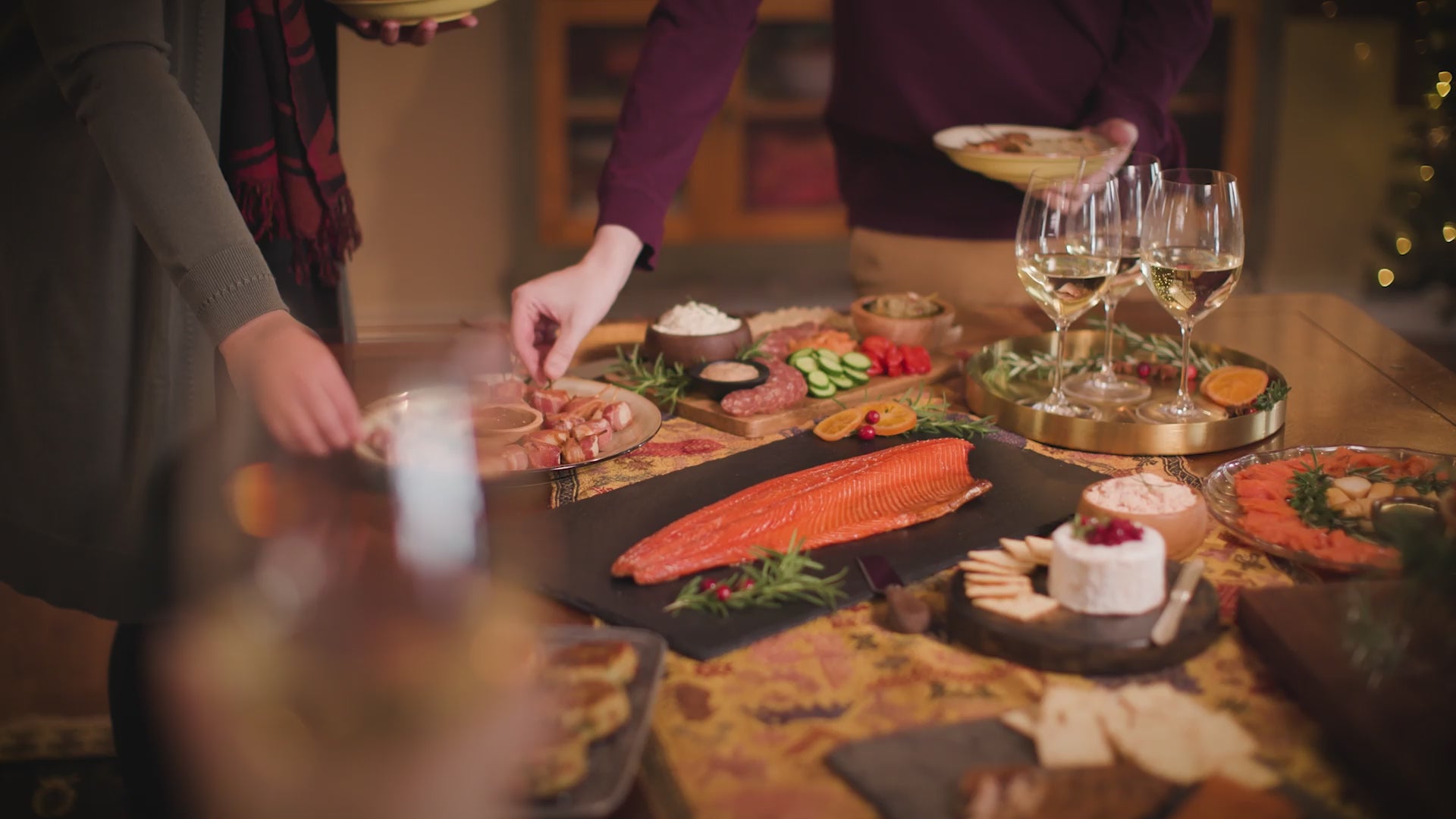 Video of holiday party goers enjoying a tasty spread of seasonal SeaBear delights.